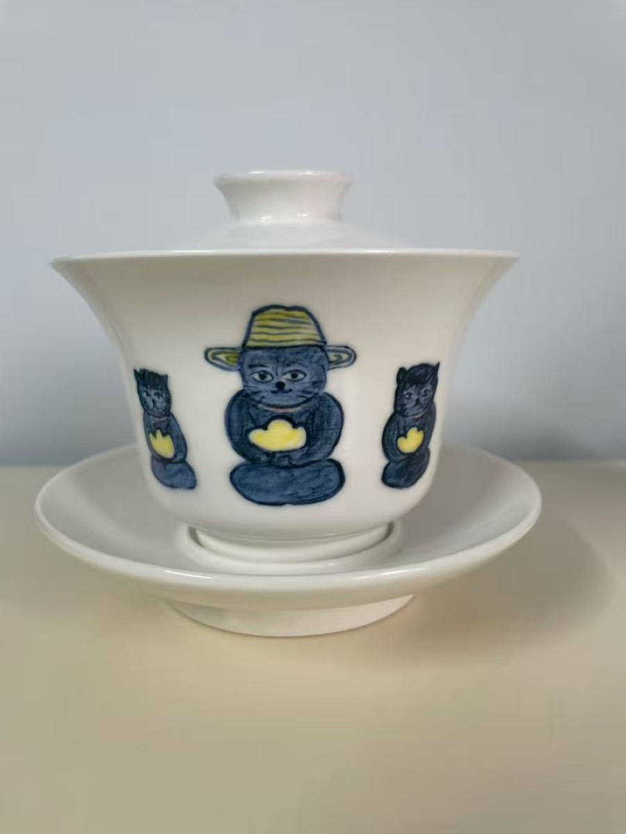 Deng Ying lidded cup with seated cat figure.